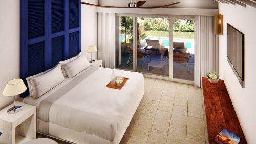 Viva V Samana by Wyndham, A Trademark Adults All Inclusiveにあるベッド