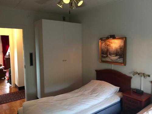 En eller flere senge i et værelse på BoSmart Apartments