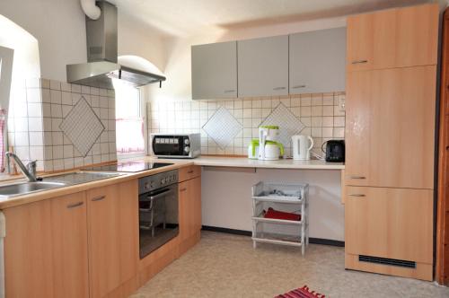 Kuchyň nebo kuchyňský kout v ubytování Mostheuriger Steyrdurchbruchalm