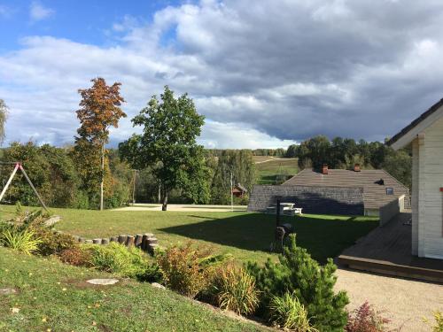 a view of a yard with a house at Vasekoja Holiday Center in Vahtseliina
