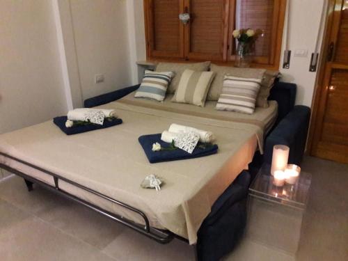 Ένα ή περισσότερα κρεβάτια σε δωμάτιο στο casa Fantulìn Mare