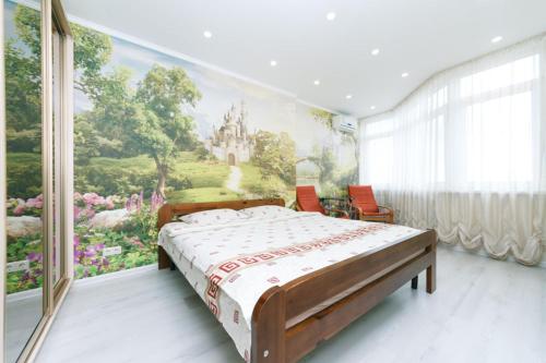 Katil atau katil-katil dalam bilik di Осокорки современные апартаменты люкс с 2-мя спальнями пр Бажана