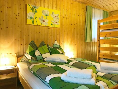 Postel nebo postele na pokoji v ubytování Ferienhaus Bergfee