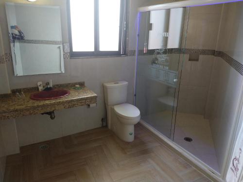 Ένα μπάνιο στο Hotel Siesta del Sur