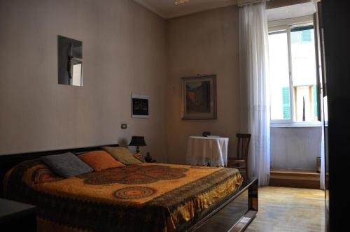 Posteľ alebo postele v izbe v ubytovaní The Queen's Coffer Rome