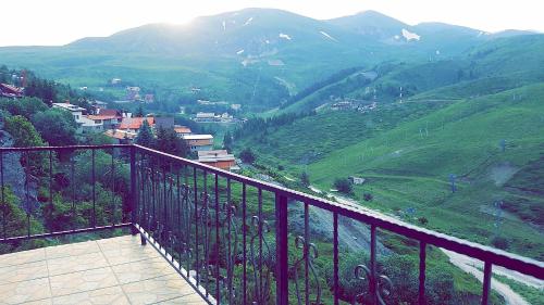 a balcony with a view of a mountain at Villa Winterfell Popova Shapka in Popova Shapka