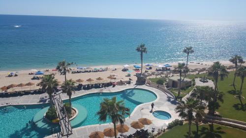 an aerial view of a resort pool and the beach at Sonoran Sun Resort in Puerto Peñasco