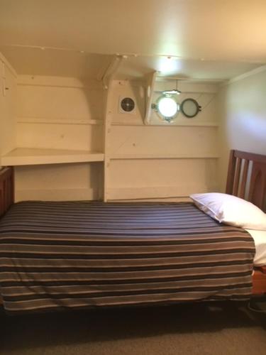 Ένα ή περισσότερα κρεβάτια σε δωμάτιο στο Woodlyn Park Motel