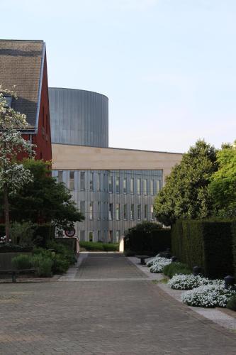 a large building with a pathway in front of it at Studio des jardins suspendus in Liège
