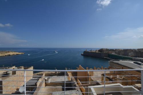 a view of the ocean from a ship at Valletta Dream Suites in Valletta
