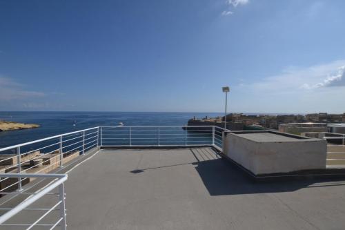 a view of the ocean from the top of a building at Valletta Dream Suites in Valletta