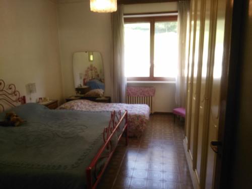 Gran Paradiso huge apartament in Locanaにあるベッド