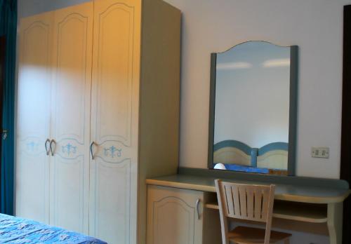 Cama o camas de una habitación en Residence Porto Mannu