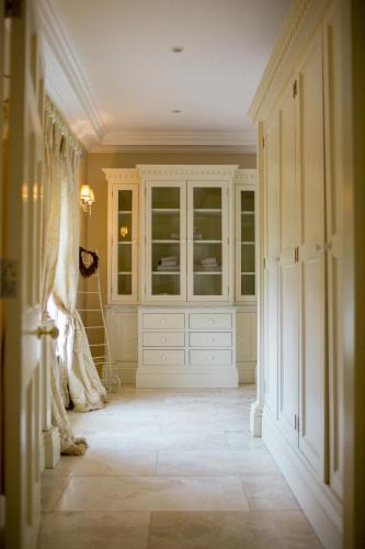 a wedding dress in a hallway of a home at Tankardstown House in Slane