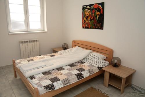 Postelja oz. postelje v sobi nastanitve Petars Apartment