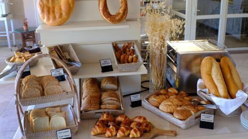 a display of bread and pastries in a bakery at Ece Saray Marina Resort in Fethiye