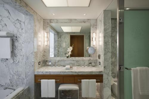 a bathroom with a sink and a mirror at Alvear Art Hotel in Buenos Aires
