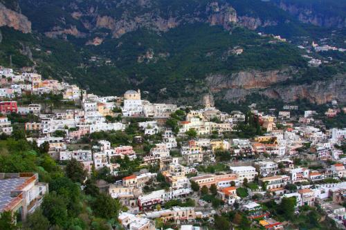 an aerial view of a city with mountains at IL PARADISO DEGLI DEI 2 in Agerola