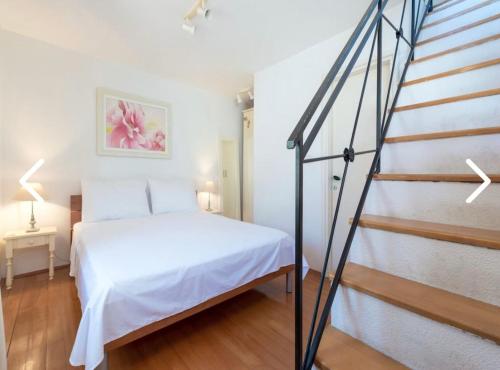Postel nebo postele na pokoji v ubytování Apartments Mak