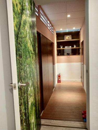 a hallway with a door leading into a room at 博愛泊旅讀心境 in Hualien City