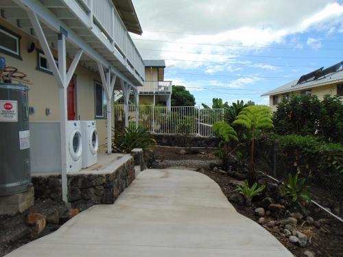 a walkway in front of a house at Ohana Hale in Kailua-Kona