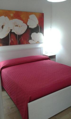 Postel nebo postele na pokoji v ubytování Casa Vacanze Surriano