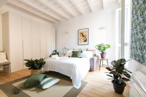 Postel nebo postele na pokoji v ubytování Quattro Stanze @ Quattro Vie