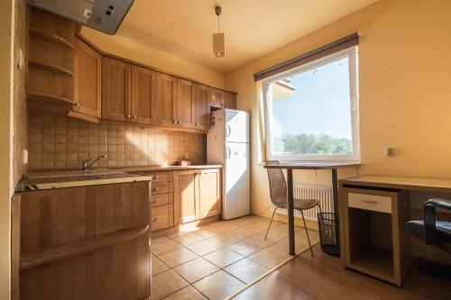 Kuchyň nebo kuchyňský kout v ubytování Metro Kabaty Studio