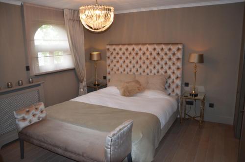 Postel nebo postele na pokoji v ubytování B&B Serenity