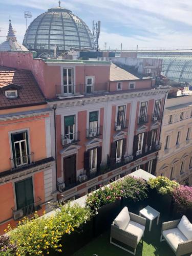 a view of a city with buildings and a dome at Dimora Augusteo in Naples
