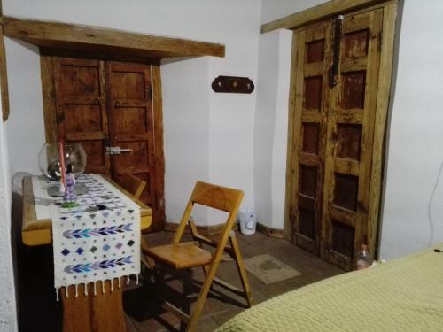 Postel nebo postele na pokoji v ubytování Casa del siglo XVII