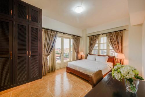 Ένα ή περισσότερα κρεβάτια σε δωμάτιο στο City View Apartment