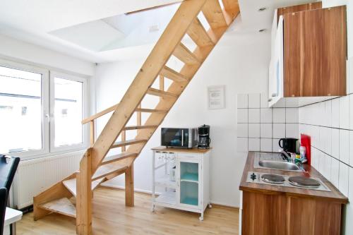 Dapur atau dapur kecil di Top Apartments in zentraler Lage
