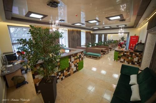 Lobbyn eller receptionsområdet på Coin Apartments & Poshtel