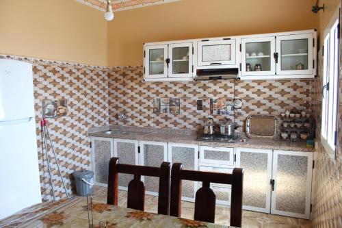 Η κουζίνα ή μικρή κουζίνα στο Merzouga Luxury Apartment