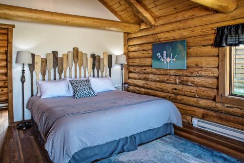 Postel nebo postele na pokoji v ubytování Triangle C Cabins