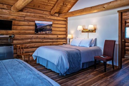 Postel nebo postele na pokoji v ubytování Triangle C Cabins