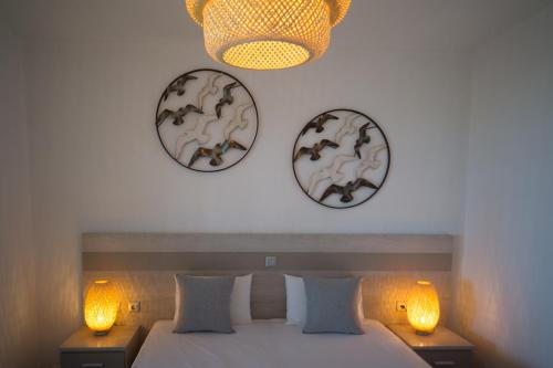 Ένα ή περισσότερα κρεβάτια σε δωμάτιο στο Alkinoos Beach Hotel