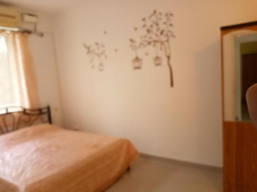 Postel nebo postele na pokoji v ubytování Casberly Apartment