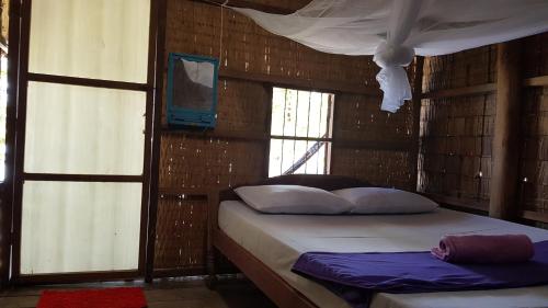 Letto o letti in una camera di Khim Vouch Ay Rabbit island