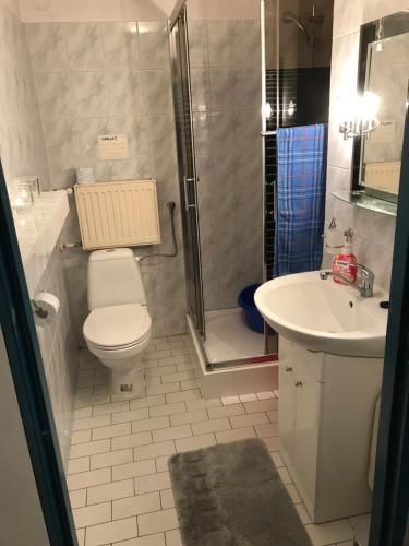 Kúpeľňa v ubytovaní Pokoje Gościnne Pod Magnolią