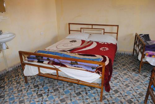 Postelja oz. postelje v sobi nastanitve Auberge Restaurant Rooftop Tamazirt