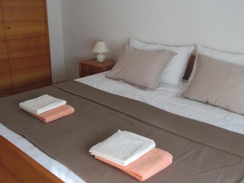 Postel nebo postele na pokoji v ubytování adrian