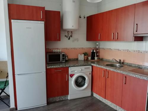 Kuchyňa alebo kuchynka v ubytovaní Ático Dos Terrazas Málaga Centro