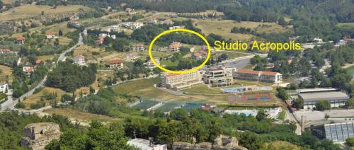 an aerial view of a building with a yellow circle at Studio Acropolis Serres With Parking Next to Center in Serres