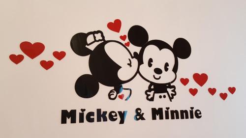 a couple of mickey and minnie hearts at Sweet Suger B&B in Luodong