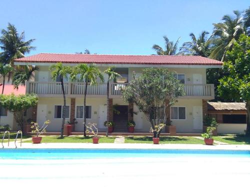 Foto da galeria de Happy Ripples Beach Resort em Mabilao