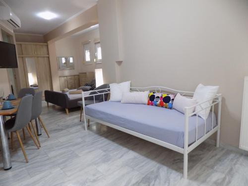 Ένα ή περισσότερα κρεβάτια σε δωμάτιο στο Mastiha Villas in Town
