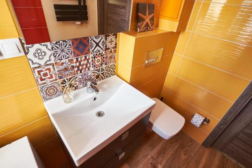 Vonios kambarys apgyvendinimo įstaigoje Noctis Apartment Tamka