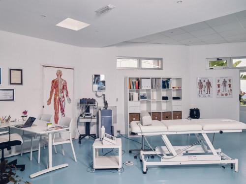 a hospital room with a skeleton on the wall at Route Active Hotel in Los Realejos
